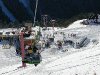 Четвертая очередь парнокресельной дороги - ведет до основного места дислокации горнолыжников и бордеров - поляны под г. Муса на высоте 2500 м